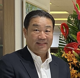 上野取締役仮トリミング写真2.jpg